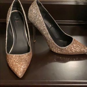 Glistening silver and gold heels